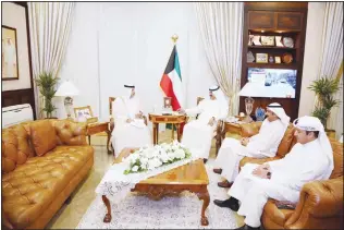  ?? KUNA photos ?? Deputy FM Al-Jarallah receives UAE Ambassador Saqer Al-Raisi.