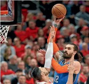  ?? AP ?? Kiwi and Thunder centre Steven Adams shoots over Portland’s Enes Kanter in their NBA clash yesterday.