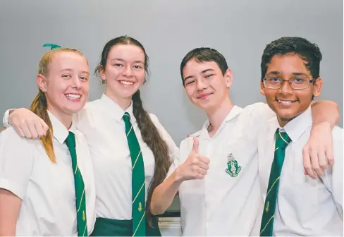  ??  ?? GRINNING WINNERS: Trinity Anglican School’s Year 9/10 virtual debating team (from left) Tegan Wells, Stephanie Tung-Yep, researcher Jesse Jorgensen and Mohak Sengupta. BELOW: Team member Mohak Sengupta in winning form.