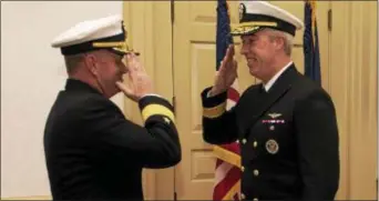  ?? COURTESY OF U.S. NAVY ?? Rear Adm. Sam Paparo relinquish­es command of Carrier Strike Group (CSG) 10 to Rear Adm. John Meier during a change of command ceremony.