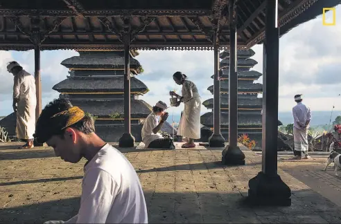  ?? Picture / Michael Dean Morgan ?? Blessings at Besakih. Besakih Temple, Bali's “Mother Temple”.