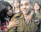  ?? Picture: REUTERS ?? NO REGRET: Israeli soldier Elor Azaria with his mother at the sentencing hearing at a military court in Tel Aviv, Israel, yesterday