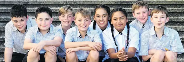  ?? PHOTO: STEPHEN JAQUIERY ?? First lesson 1+1 . . . Kavanagh College’s record four sets of year 7 twins (from left) Konrad and Levi Maaka, Noah and Heath Kettish, Maria and Katalena Moata’ane, and Liam and Benjamin Davis, all aged 11.