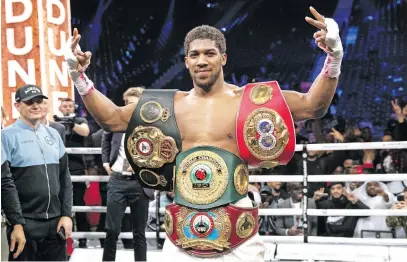  ?? Picture: Getty Images ?? BACK HOME. Anthony Joshua with the IBF, WBA, WBO & IBO world heavyweigh­t title belts after beating Andy Ruiz Jr at the Diriyah Season in Saudi Arabia on Saturday night.