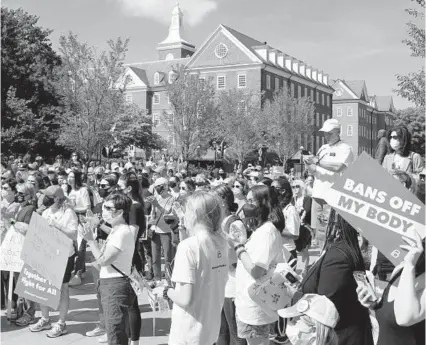  ?? BARBARA HADDOCK TAYLOR/BALTIMORE SUN ?? A crowd rallies in support of abortion rights Saturday at Lawyers Mall outside the Maryland State House in Annapolis.