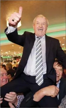  ??  ?? Deputy McLoughlin is lifted shoulder high after his election late on Sunday night. Pic: Carl Brennan.