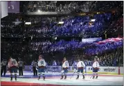  ?? AP PHOTO/PHELAN EBENHACK ?? The Colorado Avalanche and the Tampa Bay Lightning stand during the national anthem before the first period of Game 4 of the NHL hockey Stanley Cup Finals on Wednesday, June 22, 2022, in Tampa, Fla.