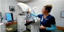  ??  ?? One study of 90,000 British women cast doubt on the worth of mammograms.