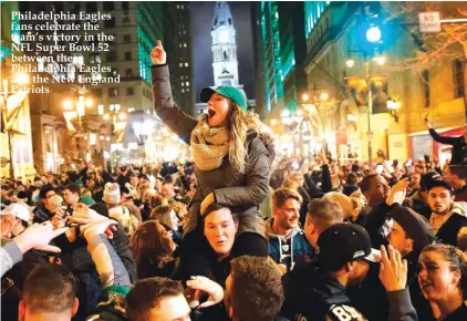  ??  ?? Philadelph­ia Eagles fans celebrate the team’s victory in the NFL Super Bowl 52 between the Philadelph­ia Eagles and the New England Patriots