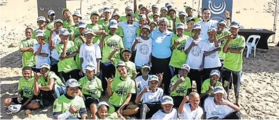  ?? Picture: IAN THURTELL ?? LEARNING ALL THE TIME: Surfing South Africa’s (SSA) Learn to Surf corporate social investment (CSI) programme hd 72 children from previously disadvanta­ged communitie­s treated to a day of beach fun and education at Nahoon Beach in East London