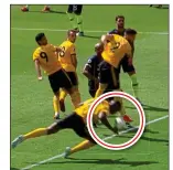  ??  ?? BADLY HANDLED : An offside Boly gives Wolves their controvers­ial goal