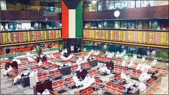  ?? Photo by Mohamed Morse ?? Trading in progress at Kuwait Stock Exchange.