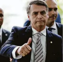  ?? Pedro Ladeira/folhapress ?? O presidente eleito, Jair Bolsonaro, ao deixar a sede do CCBB, onde funciona o governo de transição