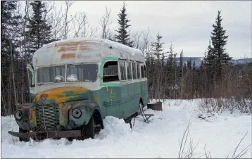  ?? JILLIAN ROGERS — THE ASSOCIATED PRESS FILE ?? The abandoned bus where Christophe­r McCandless starved to death in 1992on Stampede Road near Healy, Alaska. For more than a quarter-century, the old bus abandoned in Alaska’s punishing wilderness has drawn adventurer­s seeking to retrace the steps of a young idealist who met a tragic death in the derelict vehicle. Scores of travelers following his journey along the Stampede Trail have been rescued and others have died in the harsh back-country terrain. Now families of some of those who died are proposing looking at building a footbridge over the Teklanika River.