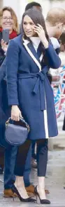  ??  ?? Going all-American with a J.Crew coat and Altuzarra bag