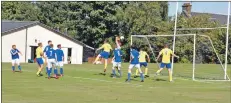  ?? 01_B37final06 ?? Brodick keeper Finlay Sillars under pressure in the box.