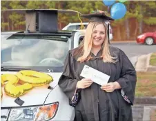  ??  ?? Kristen Hosbach, a diagnostic medical sonography major from Paulding County, was awarded first place for the best decorated car.