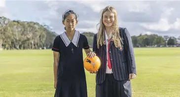  ?? PHOTOS: ADELE RYCROFT/STUFF ?? Palmerston North Girls’ High School students Alice Kang, left, and Ella Johns-Stewart have been selected in the New Zealand under-16 secondary schools team.