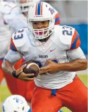  ?? STAFF FILE PHOTO BY ROBIN RUDD ?? Northwest’s Dominique Sistrunk looks for running room against Ringgold in a 2016 game. Sistrunk was named the player of the week after rushing for 273 yards and scoring five touchdowns against Ringgold last Friday.