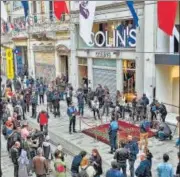  ?? AFP ?? People mourn the victims of Sunday’s explosion at the busy shopping street of Istiklal in Istanbul, on Monday . Turkey has accused the outlawed Kurdistan Workers' Party for the bombing that killed six people and wounded scores, saying more than 20 people have been arrested.