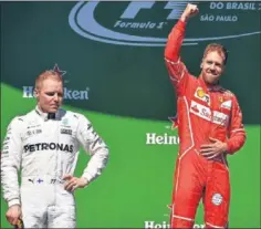  ??  ?? PODIO. Bottas, segundo en Interlagos por detrás de Vettel.
