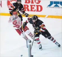  ?? JULIE JOCSAK THE ST. CATHARINES STANDARD ?? St. Catharines’ Christian Girhiny (61), shown in action against Hamilton in this file photo, had three points as the Falcons defeated Welland.