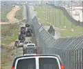  ?? EVAN VUCCI/AP ?? A motorcade carrying President Trump drives along the border to look at wall prototypes, on March 13 in San Diego.