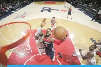  ??  ?? WASHINGTON: Markieff Morris #5 of the Washington Wizards shoots the ball against the Cleveland Cavaliers on Sunday at Capital One Arena in Washington. —AFP