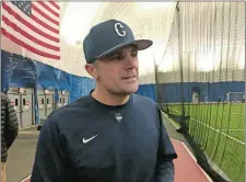  ?? GAVIN KEEFE/THE DAY ?? UConn baseball coach Jim Penders speaks with the media during a preseason practice in February.