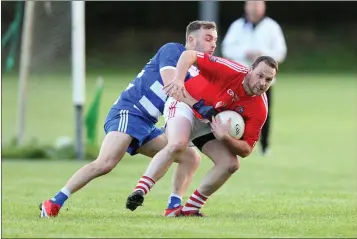  ??  ?? Valleymoun­t’s Brian Miley battles with Blessingto­n’s Ciaran Mescall.