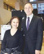  ??  ?? City of Dreams Manila VP for public relations Charisse Chuidian with 2017 Men of Extraordin­ary Influence awardee and City of Dreams Manila property president Geoff Andres.
