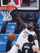 ?? GETTY IMAGES ?? Paul George of the LA Clippers, above, and, right, the Minnesota Timberwolv­es’ Rudy Gobert.