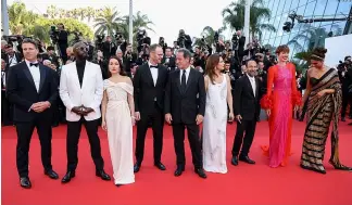  ?? ?? Jury members Joachim Trier, from left, Jeff Nichols, Noomi Rapace, jury president Vincent Lindon, jury members Jasmine Trinca, Asghar Farhadi, Rebecca Hall, Ladj Ly, and Deepi