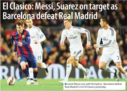  ?? Lionel Messi runs with the ball as Barcelona defeat Real Madrid 3-0 in El Clasico yesterday. ??