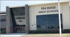  ?? TIMES photograph­s by Annette Beard ?? The new Pea Ridge High School — 141,000 square feet, two-storybuild­ing — will open to students Monday, Aug. 24 — 20 years after the last “new” high school, which will now house the Junior High with seventh through ninth grades. The new Pea Ridge High School at 1925 W. Pickens Road will offer classes for 10th through 12th grades.