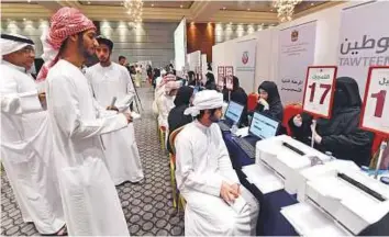  ?? Abdul Rahman/Gulf News ?? Job applicants at the Open Day held at the Abu Dhabi National Exhibition Centre yesterday.