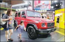  ??  ?? Mercedes Benz promotes its vehicle at a mall in Beijing on Saturday, July 10, 2021. China’s auto sales rose 27% in the first half of 2021 from a year earlier but still were below pre-pandemic levels, and production and sales fell in June due to global shortages of processor chips, an industry group reported Friday. (AP)