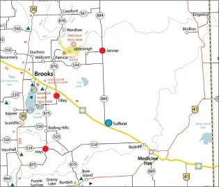  ?? NEWS GRAPHIC MICHELLE DOUVILLE ?? A map shows the locations of three just-announced solar farms (red dots) in southeaste­rn Alberta to be built by Canadian Solar, Inc., which was awarded a contract to meet about half Alberta’s provincial facilities’ needs. The blue dot shows the Suffield location of a $49-million farm the company had already moved forward with.