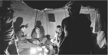  ??  ?? The last photo taken with Alberto Zerain and Mariano Galvan by the photograph­er on the approach trek to the Base Camp at Nanga Parbat, Pakistan. — Reuters photo