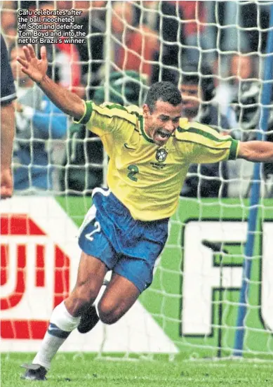  ??  ?? Cafu celebrates after the ball ricocheted off Scotland defender Tom Boyd and into the net for Brazil’s winner.