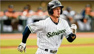  ?? WILL FAGAN/GWINNETT STRIPERS ?? Braves outfield prospect Drew Waters started the 2021 season with the Triple-a Gwinnett Stripers. The Braves decided to sell the Stripers, Mississipp­i Braves and Rome Braves.