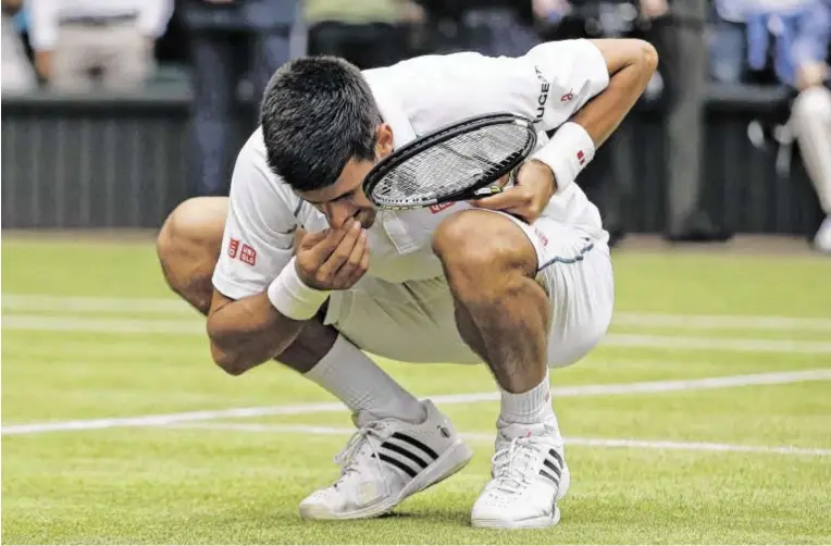 ?? BILD: SN/AP/GRANT ?? „Das Gras schmeckt in diesem Jahr sehr, sehr gut“, meinte der Serbe Novak Djokovic nach seinem insgesamt dritten Triumph in Wimbledon.