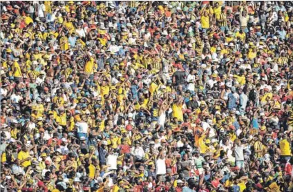  ??  ?? Faithful, but doubtful: Kaizer Chiefs is the most supported team in sub-saharan Africa, but their yellow-clad fans are becoming vocal about Amakhosi’s string of recent losses. Photo: Stringer/afp/getty Images