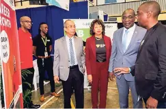  ??  ?? Dr Horace Chang (left), minister without portfolio in the Ministry of Economic Growth and Job Creation, Senator Ruel Reid (second right), minister of education, youth and informatio­n, JAMPRO, President Diane Edwards (second left) and vice-president of...