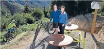  ?? PHOTO: ALDEN WILLIAMS/FAIRFAX NZ ?? Callum Bryant, 15, and his mother Julie at the Robert Bryant commemorat­ive bike seat on Turners Track.