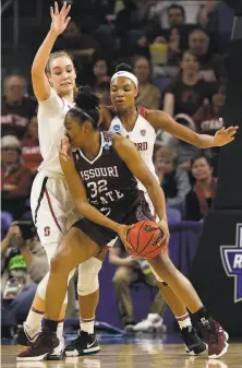  ?? Nam Y. Huh / Associated Press 2019 ?? Stanford’s Alanna Smith (left) and Maya Dodson defend Missouri State’s Jasmine Franklin in the Sweet 16 in 2019.