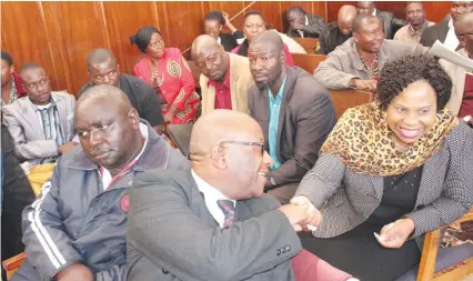  ?? Picture by Tinai Nyadzayo ?? All smiles. . . Manicaland Province MDC Alliance chairman Mr David Chimhini exchanges greetings with ZANU-PF Chimaniman­i senatorial candidate Cde Monica Mutsvangwa at the Manicaland Nomination Court in Mutare yesterday. —