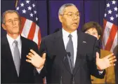  ?? Associated Press file photo ?? President-elect George W. Bush listens to retired Gen. Colin Powell speak after announcing Powell as his nominee to be secretary of state in Texas in 2000.