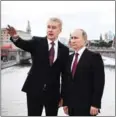 ?? AFP ?? President Vladimir Putin speaks with Moscow mayor Sergei Sobyanin (left) in the Russian capital on September 9, 2017.