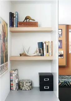  ??  ?? TOP LEFT: In Malcolm’s basement bedroom, an entire wall (and electrical panel) clad in cork creates an everchangi­ng personal art gallery. Desk, Ikea; chair, Structube; desk lamp, EQ3.
TOP RIGHT: Built-in shelves next to Malcolm’s desk add space for books and memorabili­a.